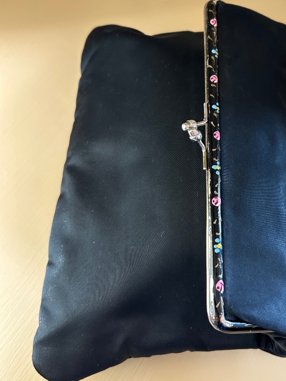 Vintage black clutch with floral painted trim